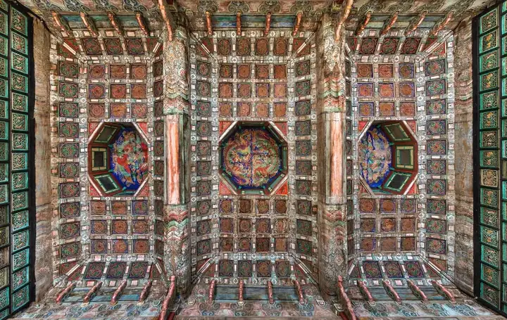 Finely painted wooden ceiling of Jibokjae Hall seen from below at Gyeongbokgung Palace in Seoul