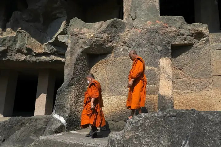 Buddhist Monks inside premises of Ajanta Caves, Maharashtra, India
