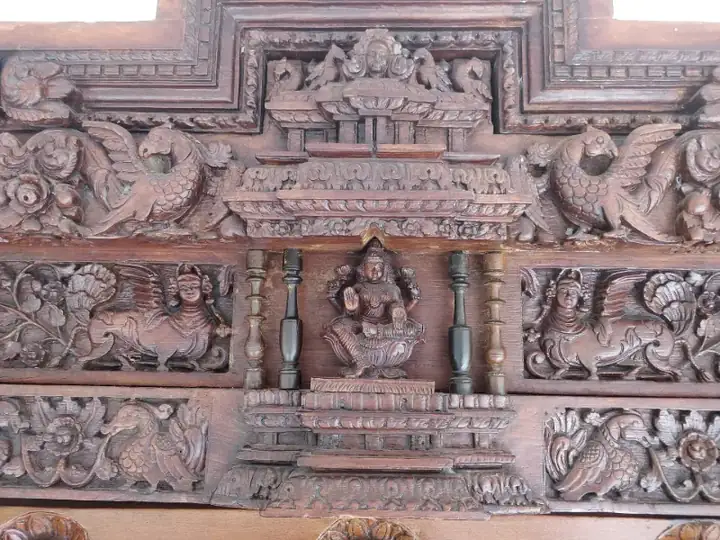 Top motif portion of Chettinad Mansion door reused in Thiruvananthapuram