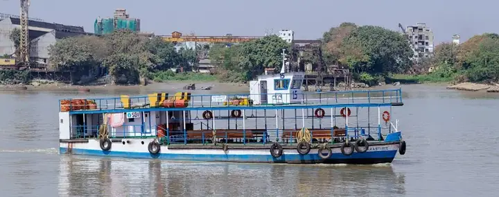 M.V.Kasturi, a ferry boat sailing on Hooghly river, image captured from Nimtala burning ghat