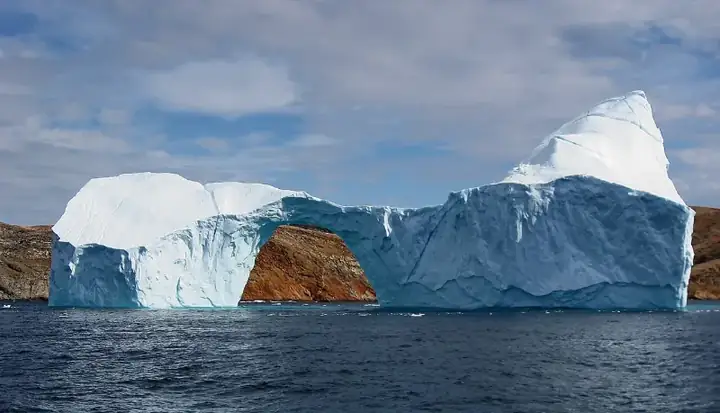 Iceberg with hole near Sandersons Hope