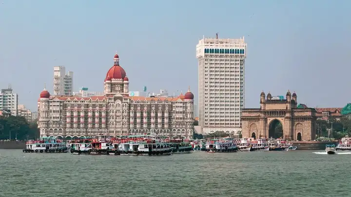 Panoramic view of Taj Palace Hotel and Taj Tower with the iconic Gateway of India in the background