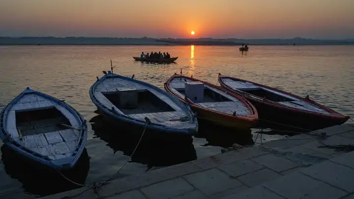 Boats at sunrise Ganges River Varanasi Uttar Pradesh Schwiki
