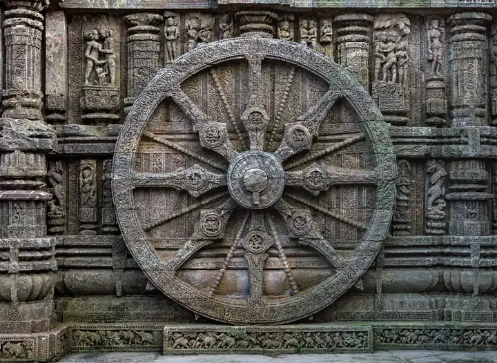 Stone wheel engraved in the century built Konark Sun Temple in Orissa, India